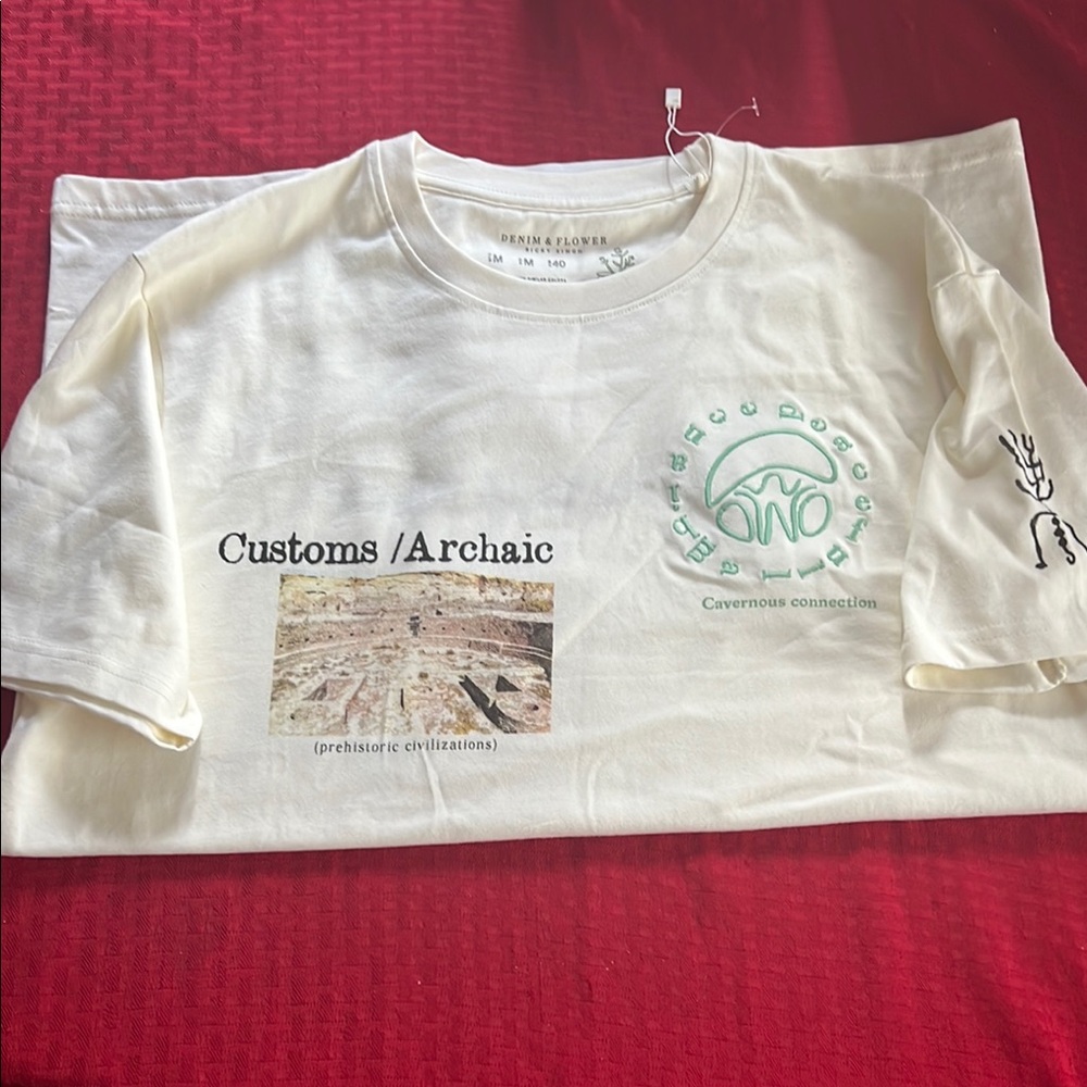 Cream Short Sleeve Tee with Customs Arrivals Print and Cityscape Design
